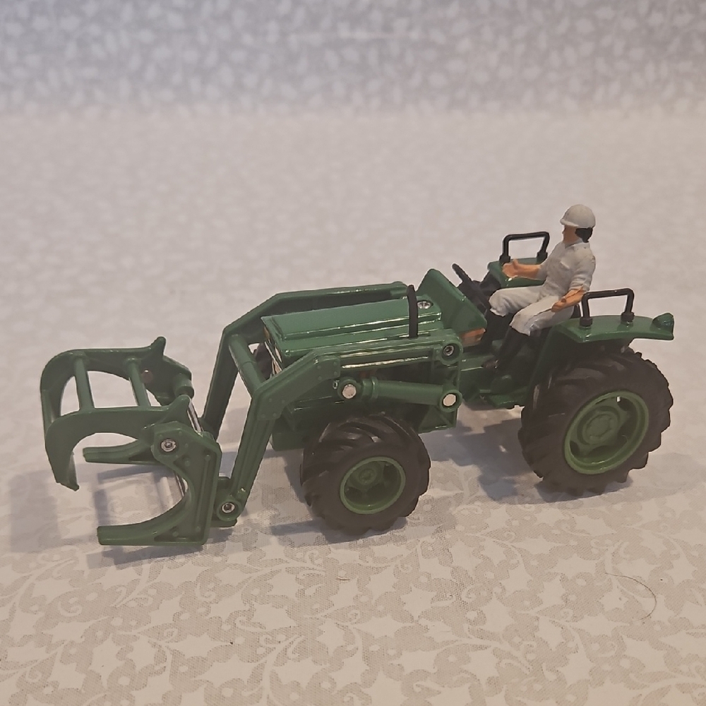 New Ray Green Friction Farm Motor Tractor Bale Picker
